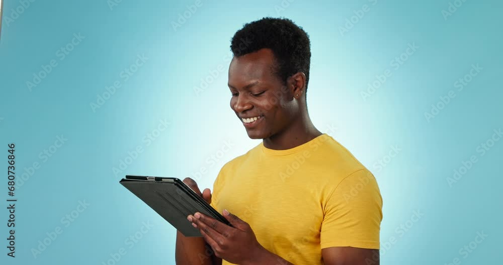 Poster typing, smile and black man with internet, tablet and connection on a blue studio background. africa