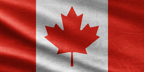 Canada flag in the old retro background effect, close up. Close up waving flag of Canada. flag symbols of Canada.