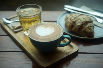 cup of hot latte art coffee