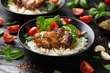 Baked balsamic chicken thighs with rice and vegetables
