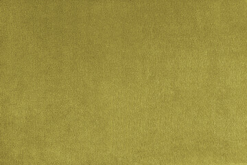 Texture background of velours yellow fabric. Upholstery texture fabric, velvet furniture textile material, design interior, decor. Fleecy fabric texture close up, backdrop, wallpaper.