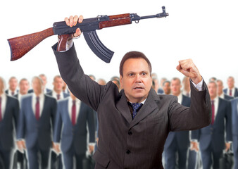 Obraz premium A armed man at the head of a mass of men in suits