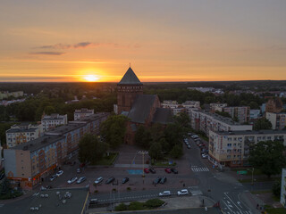 Aerial View of European town church at Sunset