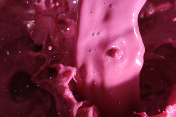 Pink liquid splash as background