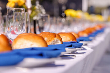 Boston, Massachusetts USA - November 19, 2023: Bread rolls on a Shabbat table installment in the...