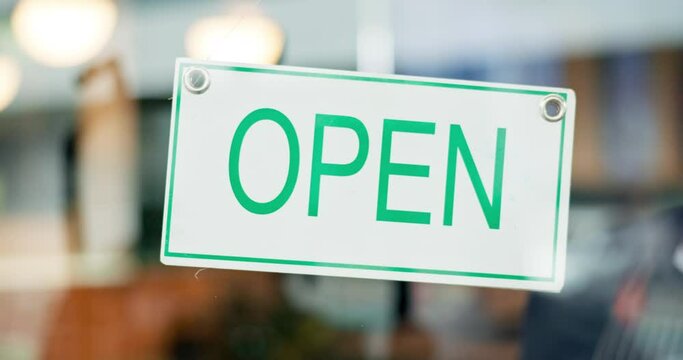 Open sign, window or cafe restaurant man smile for start of service, coffee shop store or cafeteria day. Morning storefront, glass door or diner server, waiter or boss change board at opening time
