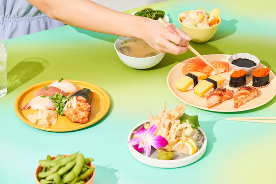 Sushi Wonderland cool tones and hand using chopsticks version 2