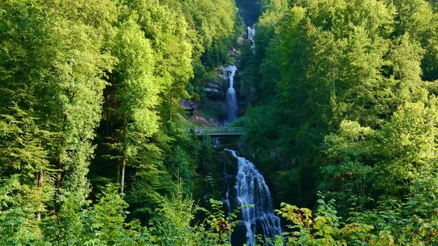 Giessbach Waterfall in the Forest in a Sunny Summer Day in Giessbach, Brienz, Bernese Oberland, Bern Canton, Switzerland, Europe