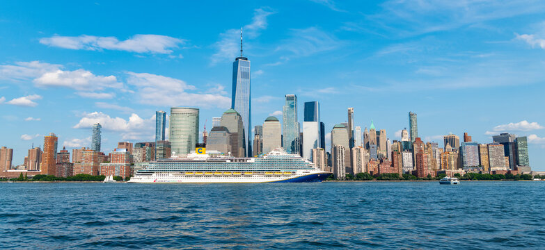 New York, USA - June 16, 2023: Cruise ship Marella Discovery Manhattan in New York. Skyline of New York Manhattan cruising on the Hudson River cruise liner TUI.