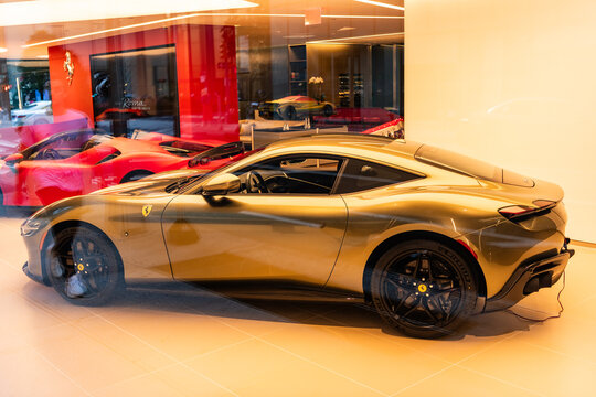 New York City, USA - August 09, 2023: Ferrari Roma 2021 sport car in dealership showroom store, side view