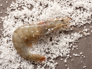 Raw shrimp sprinkled with salt