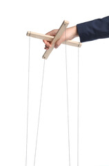 Businesswoman holding puppet control bar with strings on white background, closeup