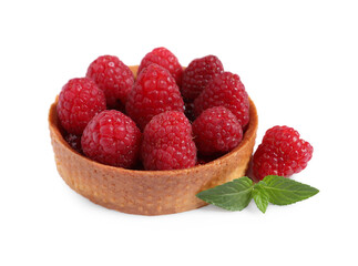 Tartlet with fresh raspberries and mint isolated on white. Delicious dessert