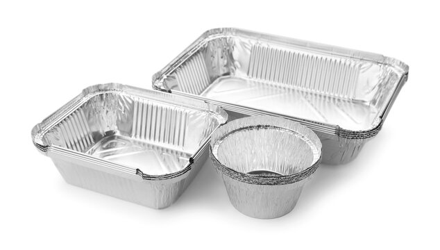 Many different aluminum foil containers isolated on white