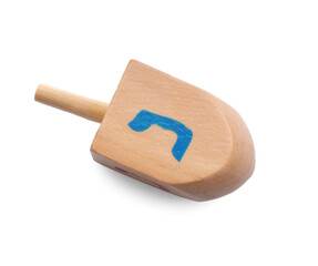 Wooden dreidel isolated on white, above view. Traditional Hanukkah game