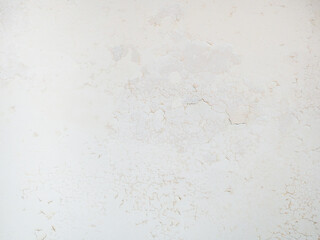 Ceiling of an old apartment. Crumbling plaster. The housing requires renovation. Background made of...