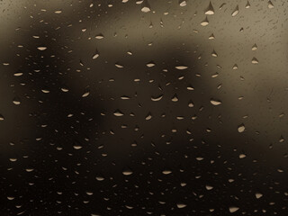 Rain Drops On Window Glasses Surface with Cloudy Background