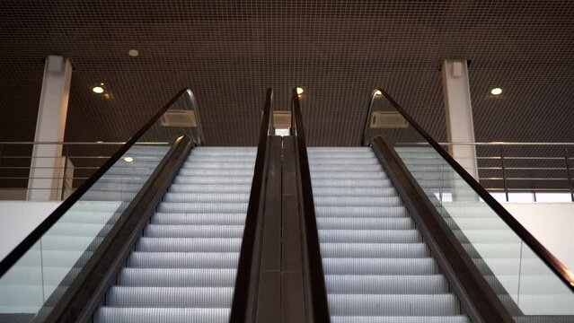 Empty Moving Staircase Running Up And Down. Media. Modern Indoor Escalator Stairs.