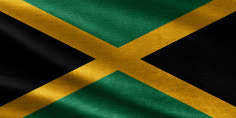 Close up waving flag of Jamaica. flag symbols of Jamaica. Jamaica flag pattern on the fabric texture ,vintage style