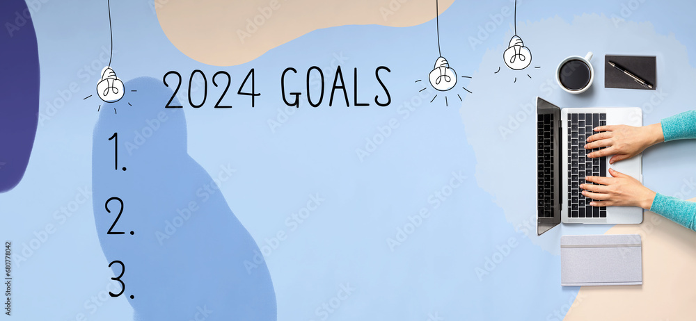 Poster 2024 goals with person using a laptop computer