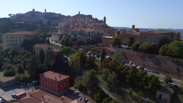 Dramatic aerial top view flight 
Montepulciano Tuscany Medieval mountain village. lift off raise up drone
4k Landscape footage