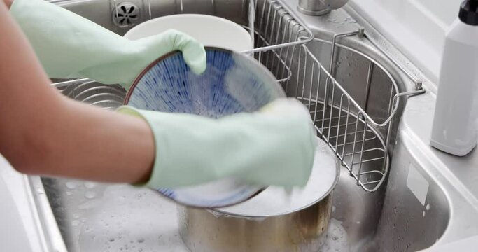 Wash dish in the kitchen