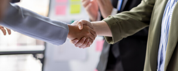 Business Team offer and give hand for handshake in office. Successful job interview. Apply for loan...
