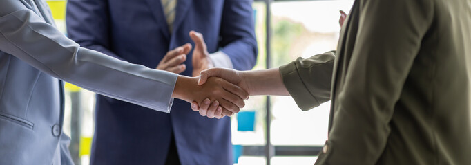 Business Team offer and give hand for handshake in office. Successful job interview. Apply for loan in bank. Salesman, bank worker or lawyer shake for deal, agreement or sale. Increase of salary.	