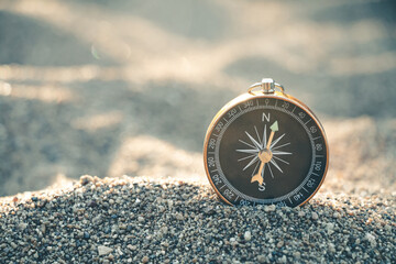 Travel of tourists with compass. compass of tourists on sandy beach. - 680796230