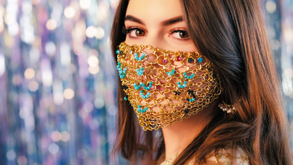 Pandemic fashion. DIY accessory. Closeup of mysterious woman with night makeup in matching glamour...