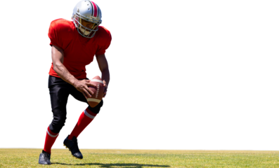 Digital png photo of male football player holding ball on transparent background