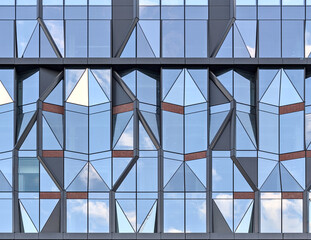 unique reflective glass building (modern architecture reflecting the sky) brooklyn abstract tower in dumbo (windows, high rise, skyscraper, cold style) angular distinctive diamond shaped window 