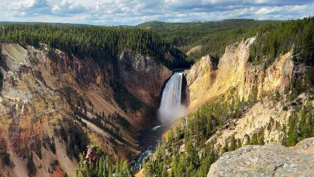 Artist Point Waterfalls Grand Canyon of the Yellowstone National Park river Upper lower Falls lookout autumn Canyon Village stunning early morning first light landscape cinematic slide left motion