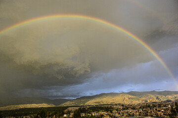 rainbow over fields in huancayo city