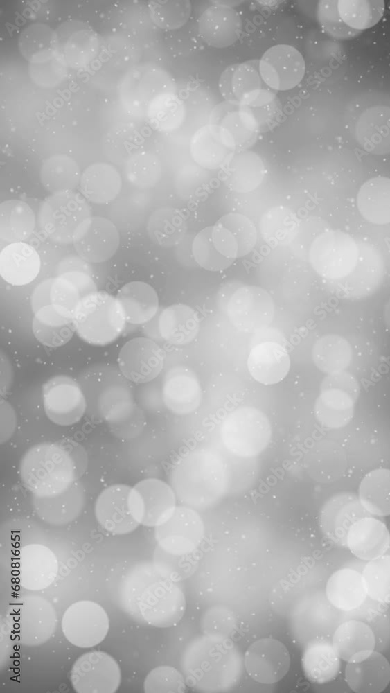 Poster silver white winter sky loop bokeh with snowfall vertical background.
