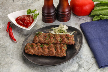 Kebab with beef served onion