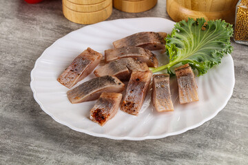 Sliced salted herring fillet snack