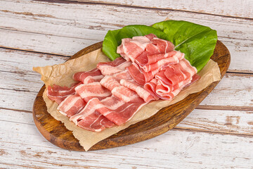 Sliced pork bacon in the bowl