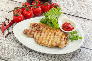 Grilled pork steak with ketchup