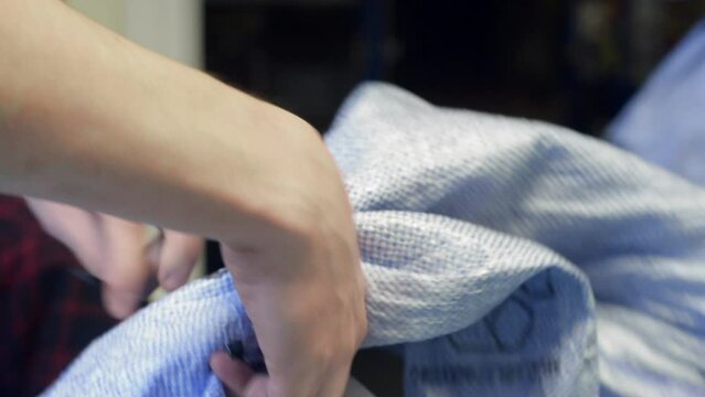Close up of postal sack being picked ready for the post office
