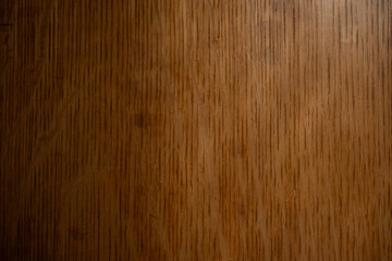 Naklejka premium The deep, rich texture of the wood paneling in a Victorian mansion.