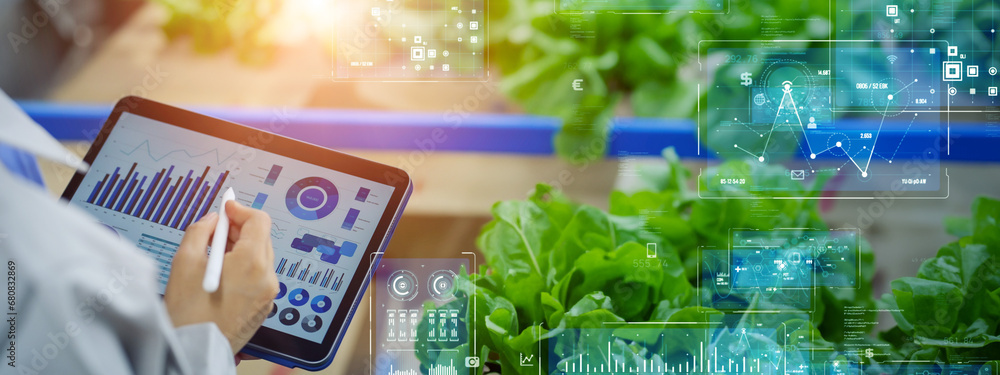Aufkleber female engineer working in the vegetable factory and digital technology concept. industrial internet