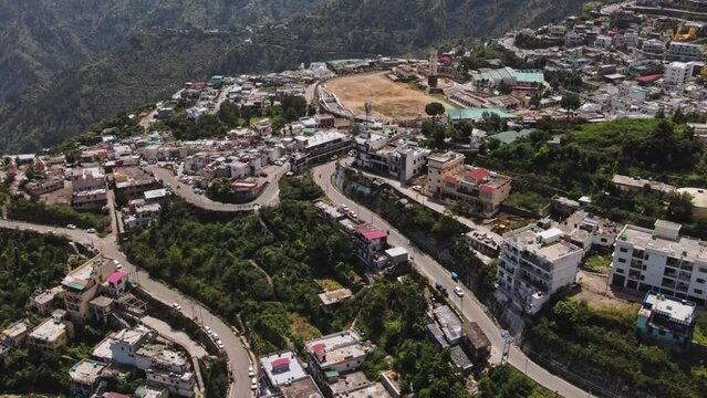 Aerial view of mountainous town New Tehri settled at the bank of Bhagirathi River in Uttarakhand. New Tehri town, near the holy city of Rishikesh the Biggest resettlement in India.