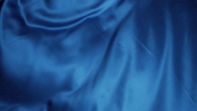 Background with a moving blue cloth