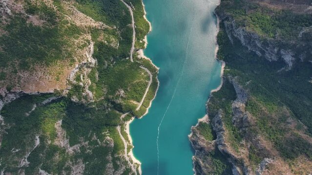 Aerial top view of Beautiful Piva river canyon with and Piva Lake (Pivsko Jezero) summer view in Montenegro. Nature travel background, 4k 