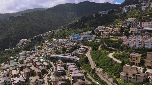 Aerial view of mountainous town New Tehri settled at the bank of Bhagirathi River in Uttarakhand. New Tehri town, near the holy city of Rishikesh the Biggest resettlement in India.