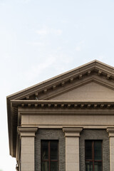 traditional vintage style building exterior with empty sky for copy space.