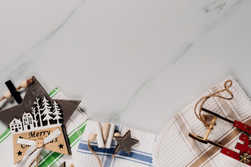 Christmas tree decorations laid out on a white background