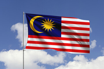 Malaysia flag fluttering in the wind on sky.