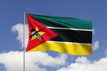 Mozambique flag fluttering in the wind on sky.
